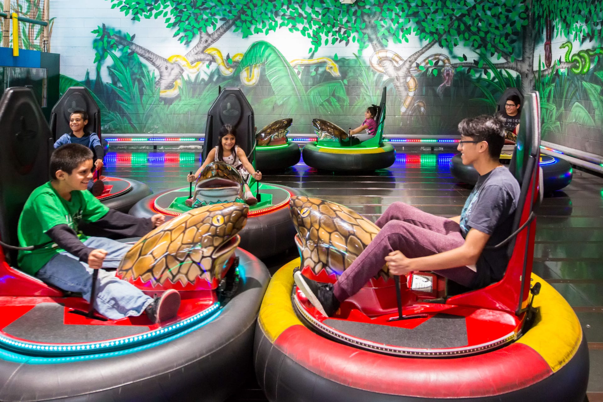 Kids playing in Bumper cars with each other