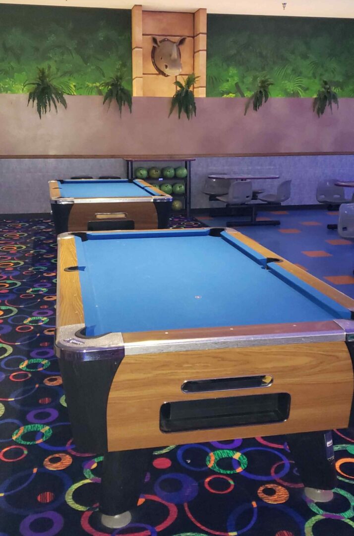 Pool table and a sitting area for children